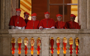 cardinals appear on a side balcony of st peter s basilica as pope ...