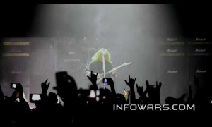 Fans of MEGADETH heavy-metal band flashing “ I LOVE SATAN ” signs!