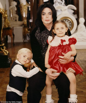 Pride and joy: Michael Jackson, pictured with his two oldest children ...