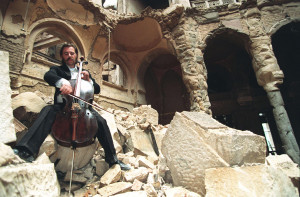 Cellist Vedran Smailovic playing Strauss in the bombed City Hall and ...