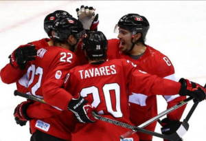 John Tavares, Drew Doughty, and some of team Canada, celebrate after a ...