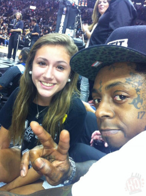 ... Spurs play Miami Heat. Also sitting courtside with Weezy F Baby was