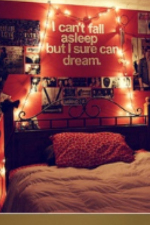 Lights and quote above bed