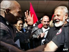 ... greeted by a die-hard supporters as he walks out of jail in June 2004
