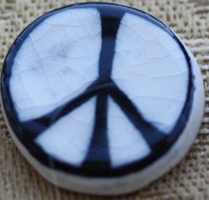 The first peace badge, 1958, made in ceramic.
