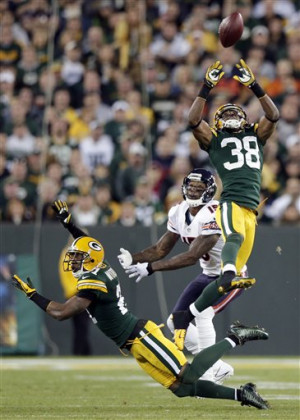 Green Bay Packers' Tramon Williams intercepts a pass in front of ...