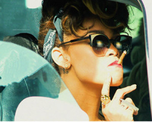 Rihanna smoking a cigarette in a car