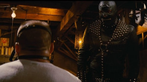 The Gimp character in Pulp Fiction, clad head-to-toe in studded black ...