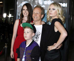 Danish director Niels Arden Oplev poses with his children L R Linea
