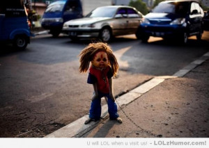 ... of nightmares: Monkey wearing Cabbage Patch Doll mask with dreadlocks