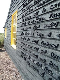 ... sunne rising | carved on the wall of derek jarman's cottage, dungeness