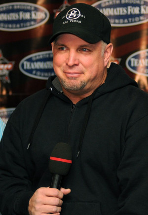 getting more of a Garth Brooks vibe. Very handsome, either way!