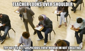 Teacher-looks-over-shoulder.jpg