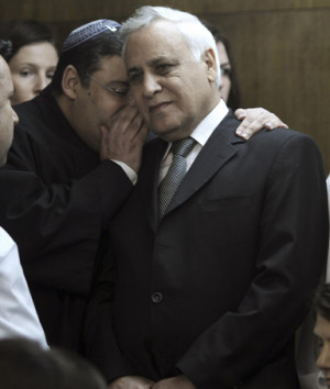 Israel's former President, Moshe Katsav, (C) is seen inside the Tel ...