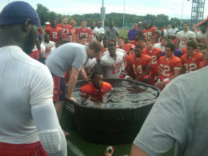 Clemson wide receiver baptized in front of team after practice