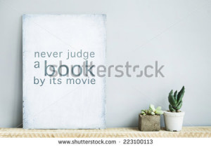 with quote NEVER JUDGE A BOOK BY ITS MOVIE with succulents in concrete ...