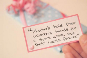 Mothers hold their childrens hands for a short