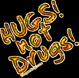 Hugs Not Drugs Orange and yellow glitter text.