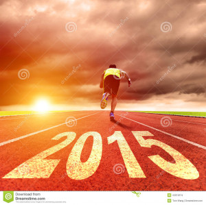 Stock Photo: Happy new year 2015. young man running with sunrise