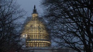 ... budget data for December on Tuesday, Jan. 13, 2015. (AP Photo/J. Scott