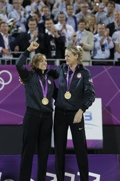 ... their gold medals during the women's beach volleyball medal ceremony