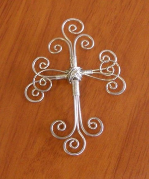 Wire cross. I would call it the sacred directions in wire.