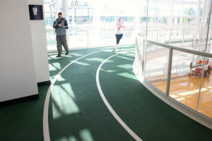 track above the court, where a Nike employee was running laps. Nike ...