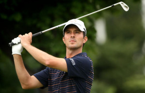 Golfer Mike Weir hits a drive on Seventh hole at the Glen Abbey Golf ...