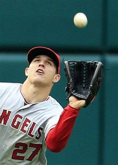 Angeles Angels' Mike Trout catches a fly ball hit by Cleveland Indians ...