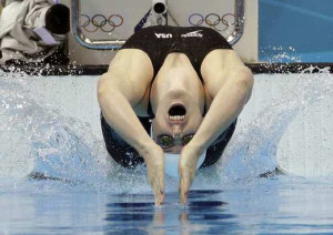 Missy Franklin starts in a women's 100-meter backstroke swimming heat.