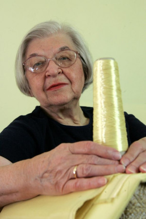 FILE - Stephanie Kwolek poses for a photo holding with a spool of ...