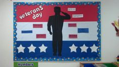 Preschool Veterans Day bulletin board featuring characteristics of a ...