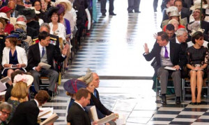 Ed Miliband and David Cameron acknowledge each other at the service of ...