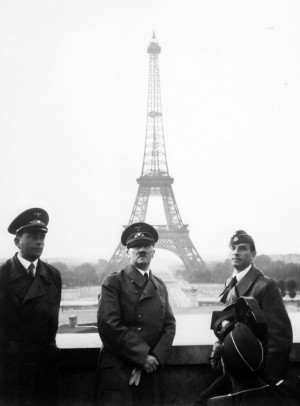 Adolf Hitler touring Paris, France, on June 23, 1940. The Eiffel Tower ...