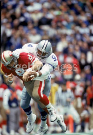 Charles Haley hits Steve Young during the 1993 NFC Championship Game.