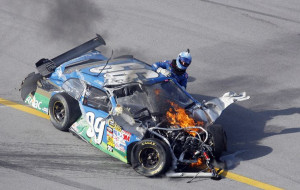 Edwards climbs out of his car uninjured, and relieved that his wreck ...