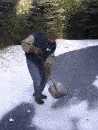 funny gif man winter falling ice shovel