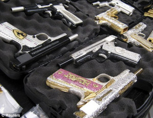 Mexican soldiers have seized an arsenal of gold-plated and diamond ...