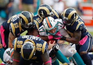 ... Miami Dolphins withstood a late rally by the St. Louis Rams to win 17