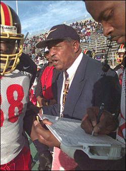 IN ACTION-Coach Robinson calls a play.