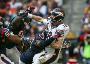 peyton-manning-joe-mays-nfl-denver-broncos-houston-texans-590x900.jpg