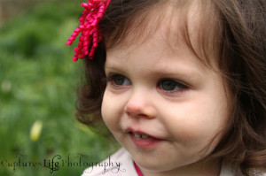 ... of a smiling caucasian real toddler little girl. She is 18 months old