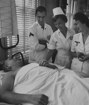 French nurse Genevieve Galard-Terraube (R) visiting ill and wounded ...
