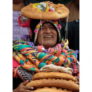 Bolivia's President Evo Morales holds bread during 'pujllay ...
