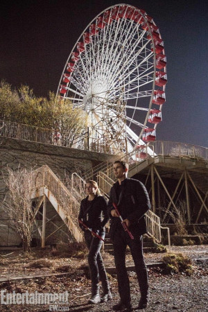 ... released. This one depicts Tris and Four in front of the ferris wheel