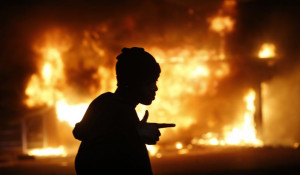 Shots Heard as Buildings Burn in Ferguson After Grand Jury Decision