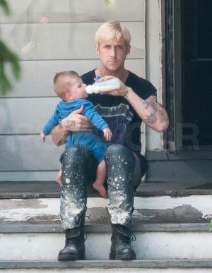 Ryan Gosling Holding a Baby on Set Pictures