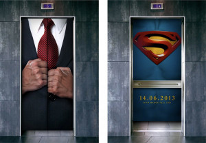 clark kents suited chest on the doors of an elevator opens up to ...