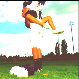 Be the cheerleader that dates the football player(: