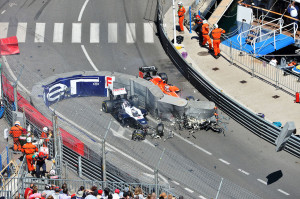 ... hits the wreckage after Pastor Maldonado's collision with Max Chilton